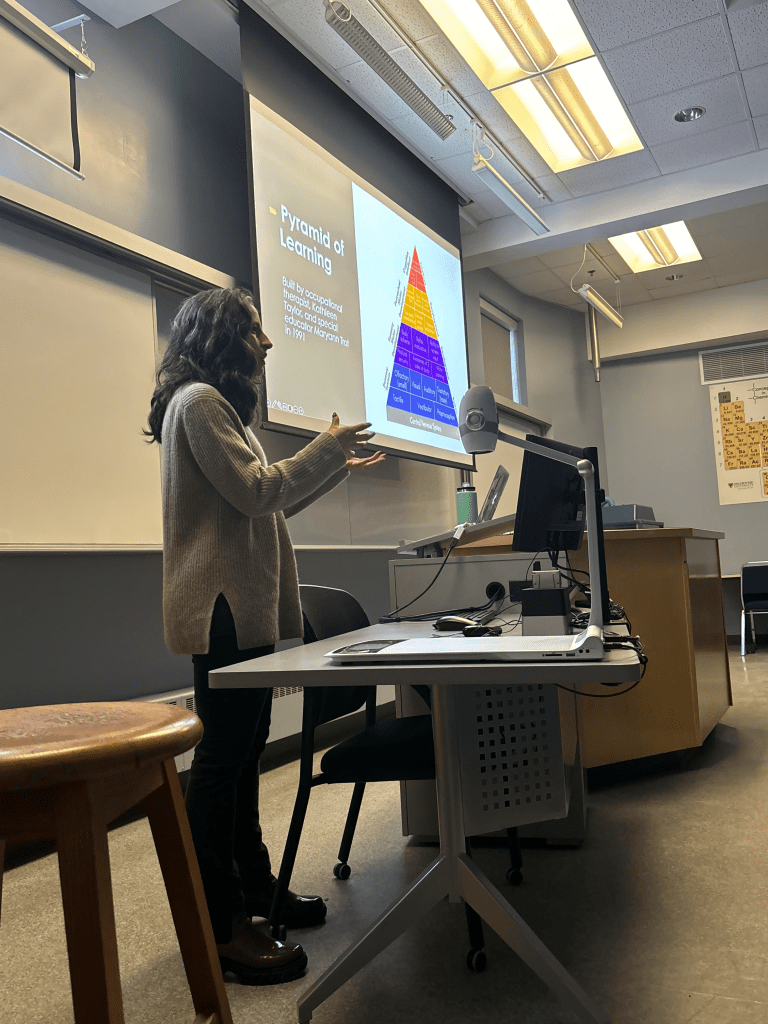 educational speaker standing about to give a presentation